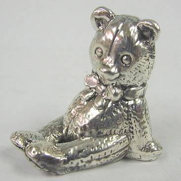 petite silver teddy bear figurine 